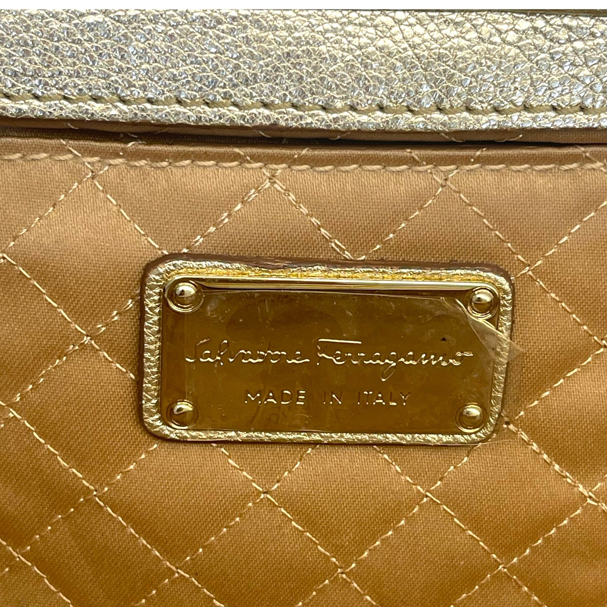 Salvatore Ferragamo Metallic Beige Leather Musa Gancini Clutch