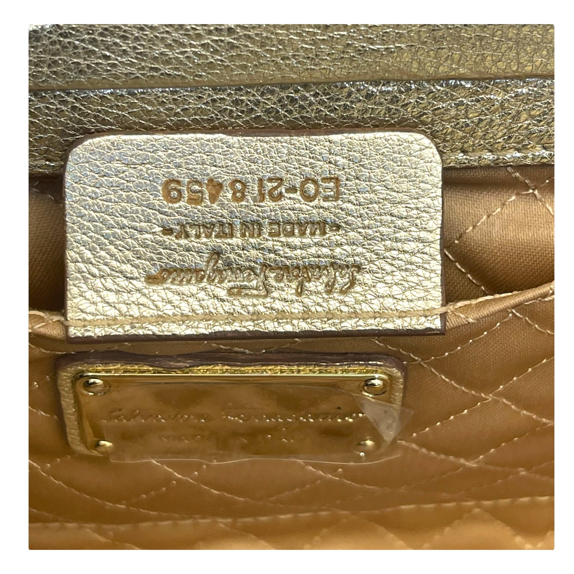 Salvatore Ferragamo Metallic Beige Leather Musa Gancini Clutch